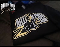 a black sweatshirt with the word billionaire club on it
